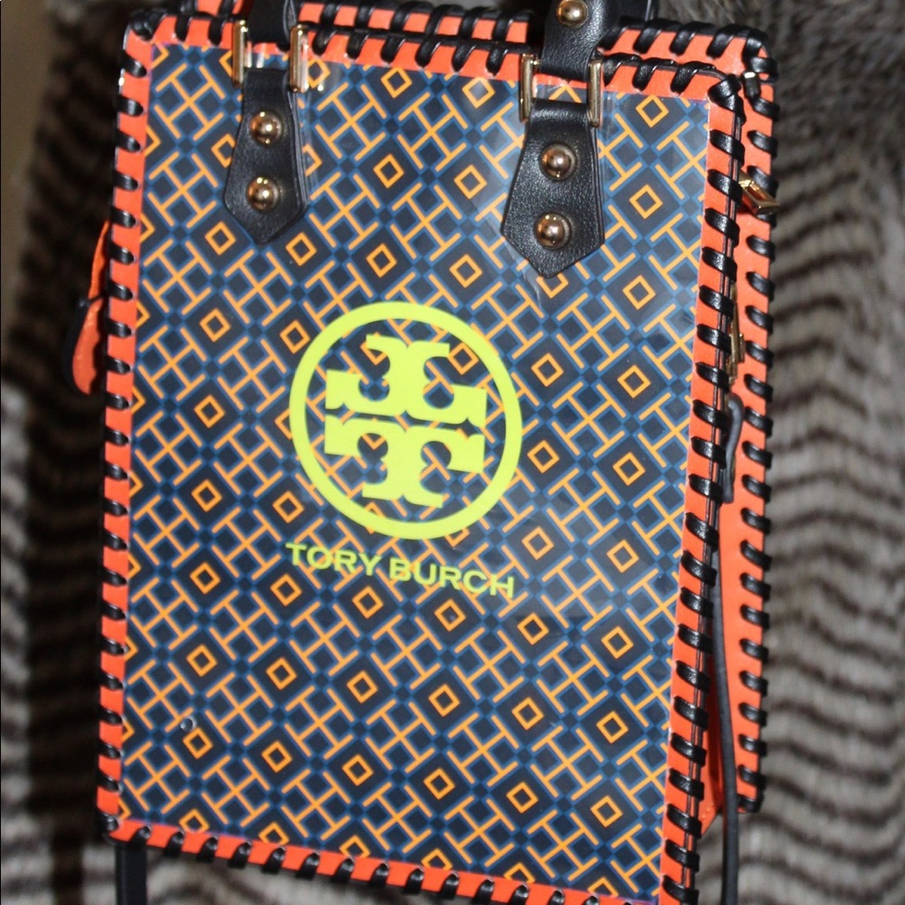 Designer shopping bag upcycled into a handbag